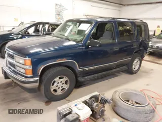 1999 Chevrolet Tahoe Z71 with VIN 1GNEK13R5XJ548832, listed as a IAAI auction lot 42077245 with 208,875 mi miles and . Bid and sale history available at DreamBid. Image 2.