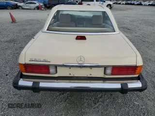 1986 Mercedes-Benz 560 SL with VIN WDBBA48D9GA042092, listed as a Copart auction lot 82438564 with 43,758 mi miles and Salvage Title. Bid and sale history available at DreamBid. Image 6.