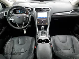 2016 Ford Fusion Titanium Hybrid z VIN 3FA6P0RU5GR356987, wystawiony jako Copart lot #48211775 z przebiegiem 145 192 mil mil oraz Szkoda całkowita • Salvage title. Historia ofert i sprzedaży dostępna na DreamBid. Obrazek 8.