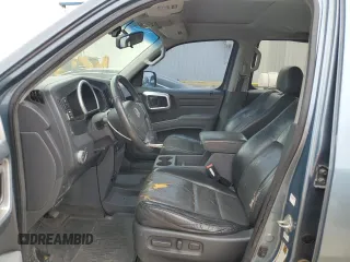 2006 Honda Ridgeline RTL with VIN 2HJYK16556H524959, listed as a Copart auction lot 50733285 with 134,389 mi miles and Salvage Title. Bid and sale history available at carsss.com. Image 7.