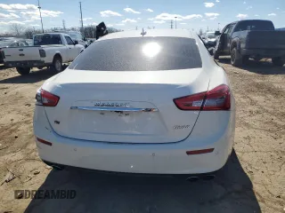 2014 Maserati Ghibli S Q4 z VIN ZAM57RTA2E1083387, wystawiony jako Copart lot #53621465 z przebiegiem Nie podano mil oraz Szkody całkowita. Historia ofert i sprzedaży dostępna na DreamBid. Obrazek 6.