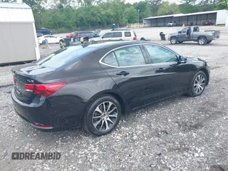 2016 Acura TLX Tech with VIN 19UUB1F58GA001343, listed as a IAAI auction lot 42136135 with 999,999 mi miles. Bid and sale history available at carsss.com. Image 4.