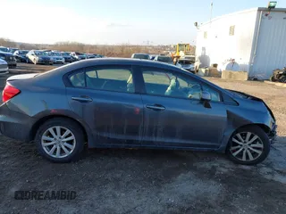 2012 Honda Civic EX-L with VIN 2HGFB2F9XCH587038, listed as a IAAI auction lot 41337259 with 114,520 mi miles and . Bid and sale history available at DreamBid. Image 14.