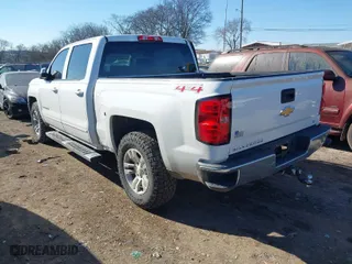 2016 Chevrolet Silverado 1500 LT with VIN 3GCUKREC1GG289513, listed as a IAAI auction lot 41407335 with 83,473 mi miles. Bid and sale history available at carsss.com. Image 3.
