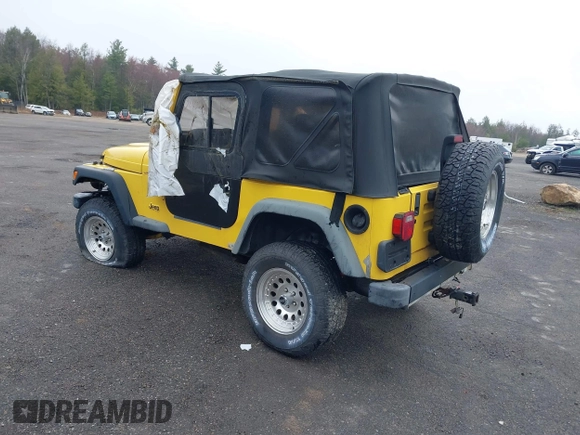 2000 Jeep Wrangler Sport with VIN 1J4FA49S9YP736984, listed as a IAAI auction lot 42055385 with 191,910 mi miles and . Bid and sale history available at DreamBid. Image 3.