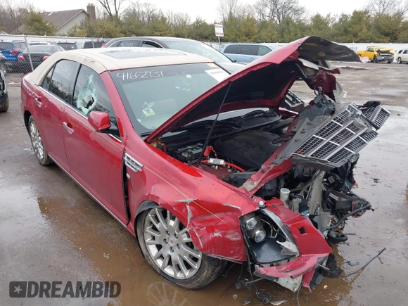 2011 Cadillac STS RWD with VIN 1G6DW6ED4B0128004, listed as a IAAI auction lot 41664631 with 546,850 mi miles and . Bid and sale history available at carsss.com. Image 6.