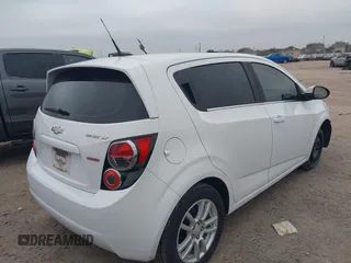 2014 Chevrolet Sonic LT with VIN 1G1JC6SB2E4215465, listed as a IAAI auction lot 41140292 with 93,224 mi miles. Bid and sale history available at carsss.com. Image 4.