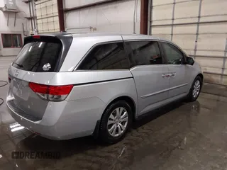 2015 Honda Odyssey EX-L with VIN 5FNRL5H66FB028822, listed as a IAAI auction lot 42067242 with 122,354 mi miles and . Bid and sale history available at carsss.com. Image 4.