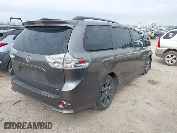 2015 Toyota Sienna SE with VIN 5TDXK3DC8FS652966, listed as a IAAI auction lot 41576611 with 108,858 mi miles and . Bid and sale history available at DreamBid. Image 4.