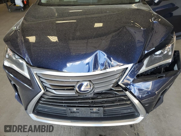 2018 Lexus RX 450h with VIN 2T2BGMCA9JC021481, listed as a Copart auction lot 57111405 with 186,533 mi miles and Salvage title. Bid and sale history available at DreamBid. Image 12.