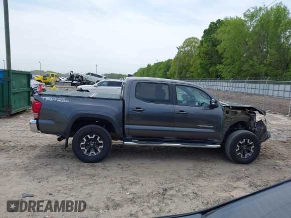 2017 Toyota Tacoma SR5 with VIN 3TMAZ5CN7HM026618, listed as a IAAI auction lot 42033682 with 96,430 mi miles and . Bid and sale history available at carsss.com. Image 14.