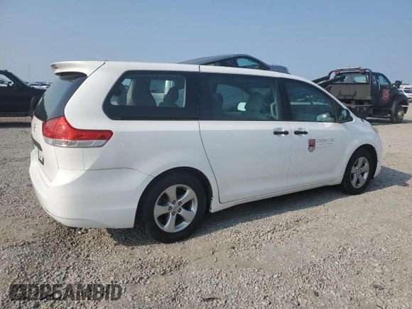 2013 Toyota Sienna L z VIN 5TDZK3DC7DS289663, wystawiony jako Copart lot #59146295 z przebiegiem 124 876 mil mil oraz Szkoda całkowita • Salvage title. Historia ofert i sprzedaży dostępna na DreamBid. Obrazek 3.