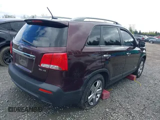 2012 Kia Sorento EX with VIN 5XYKUDA2XCG288581, listed as a IAAI auction lot 42011463 with 449,858 mi miles. Bid and sale history available at carsss.com. Image 4.