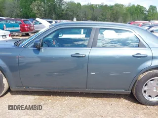 2005 Chrysler 300 with VIN 2C3AA53G35H157083, listed as a IAAI auction lot 41945392 with 192,215 mi miles. Bid and sale history available at carsss.com. Image 14.