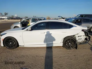 2020 Cadillac CT5 Luxury z VIN 1G6DW5RK9L0128732, wystawiony jako IAAI lot #41958505 z przebiegiem 49 919 mil mil oraz . Historia ofert i sprzedaży dostępna na DreamBid. Obrazek 14.
