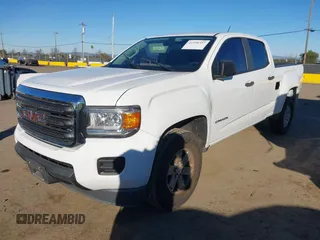 2015 GMC Canyon 2WD with VIN 1GTG5AE39F1140916, listed as a IAAI auction lot 41298357 with 96,050 mi miles and . Bid and sale history available at DreamBid. Image 2.