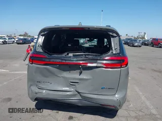 2021 Chrysler Pacifica Hybrid Limited z VIN 2C4RC1S76MR544495, wystawiony jako IAAI lot #42294312 z przebiegiem 89 083 mil mil oraz . Historia ofert i sprzedaży dostępna na DreamBid. Obrazek 16.