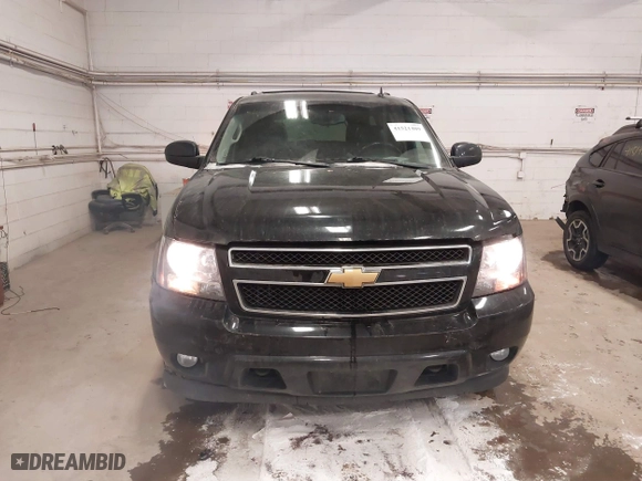 2013 Chevrolet Suburban LT with VIN 1GNSKJE75DR167705, listed as a IAAI auction lot 41521409 with 228,411 mi miles. Bid and sale history available at carsss.com. Image 12.