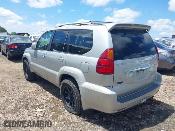2004 Lexus GX 470 with VIN JTJBT20X640035217, listed as a IAAI auction lot 42156303 with 310,711 mi miles and . Bid and sale history available at DreamBid. Image 3.
