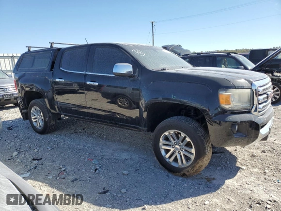 2015 GMC Canyon 2WD SLT with VIN 1GTG5CE33F1217419, listed as a Copart auction lot 73467364 with 114,542 mi miles and Salvage Title. Bid and sale history available at carsss.com. Image 4.