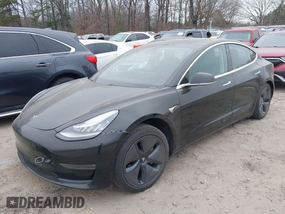 2019 Tesla Model 3 Mid Range with VIN 5YJ3E1EA5KF297213, listed as a IAAI auction lot 41361412 with 93,801 mi miles and . Bid and sale history available at carsss.com. Image 2.