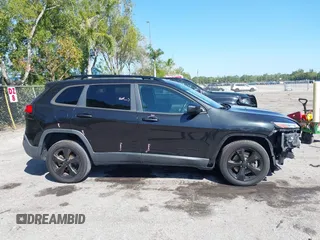 2016 Jeep Cherokee Latitude with VIN 1C4PJLCB6GW184264, listed as a IAAI auction lot 41783299 with 187,767 mi miles. Bid and sale history available at carsss.com. Image 13.