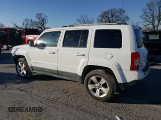 2011 Jeep Patriot Latitude X with VIN 1J4NF4GB4BD239057, listed as a Copart auction lot 85320574 with 180,792 mi miles and Salvage Title. Bid and sale history available at DreamBid. Image 2.