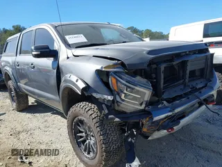 2021 Nissan Titan Pro-4X with VIN 1N6AA1ED0MN504654, listed as a IAAI auction lot 41240824 with 68,533 mi miles and . Bid and sale history available at DreamBid. Image 1.
