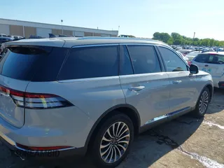2021 Lincoln Aviator Reserve z VIN 5LM5J7WC6MGL12195, wystawiony jako IAAI lot #42159567 z przebiegiem 95 199 mil mil oraz . Historia ofert i sprzedaży dostępna na DreamBid. Obrazek 13.