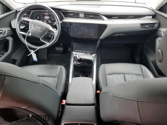 2021 Audi e-tron Premium Plus with VIN WA1LAAGE4MB003487, listed as a Copart auction lot 82790024 with 28,165 mi miles and Salvage title. Bid and sale history available at DreamBid. Image 8.