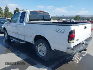1998 Ford F-150 with VIN 1FTRX18L8WKA86341, listed as a IAAI auction lot 42222043 with 315,734 mi miles and . Bid and sale history available at DreamBid. Image 3.