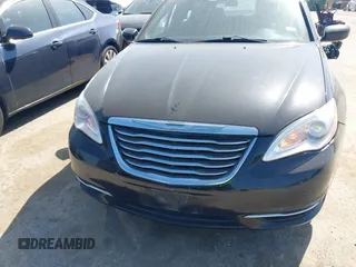 2014 Chrysler 200 LX with VIN 1C3CCBAB7EN208911, listed as a IAAI auction lot 41981884 with 144,239 mi miles and . Bid and sale history available at carsss.com. Image 6.