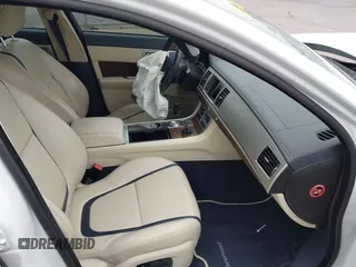 2014 Jaguar XF SC with VIN SAJWA0EX0E8U09381, listed as a IAAI auction lot 41783386 with 27,730 mi miles and . Bid and sale history available at DreamBid. Image 5.