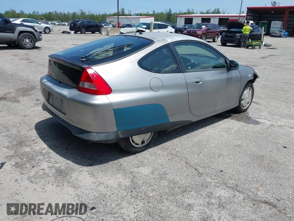 2004 Honda Insight z VIN JHMZE14744T000527, wystawiony jako IAAI lot #42378630 z przebiegiem 1 360 mil mil oraz . Historia ofert i sprzedaży dostępna na DreamBid. Obrazek 4.