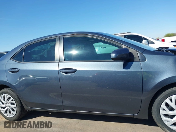 2019 Toyota Corolla L z VIN 2T1BURHE9KC217993, wystawiony jako IAAI lot #41844472 z przebiegiem 126 470 mil mil oraz . Historia ofert i sprzedaży dostępna na DreamBid. Obrazek 13.