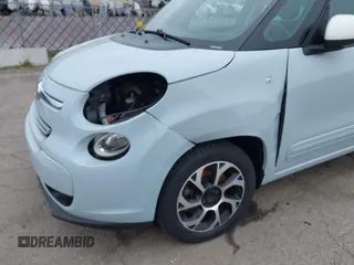2015 FIAT 500L Easy with VIN ZFBCFABH9FZ033638, listed as a IAAI auction lot 42268062 with 63,249 mi miles and . Bid and sale history available at DreamBid. Image 6.