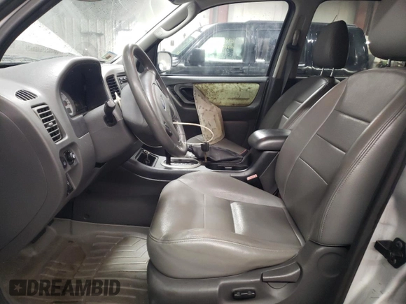 2005 Ford Escape XLT z VIN 1FMYU93145KA20050, wystawiony jako Copart lot #76794024 z przebiegiem 98 559 mil mil oraz Szkoda całkowita • Salvage title. Historia ofert i sprzedaży dostępna na DreamBid. Obrazek 7.