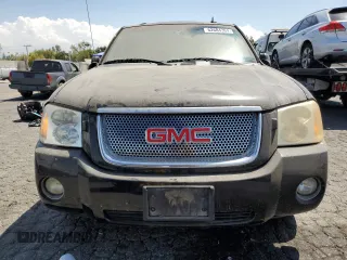 2006 GMC Envoy Denali with VIN 1GKES63M462142564, listed as a Copart auction lot 62684364 with 141,369 mi miles and Clean Title. Bid and sale history available at carsss.com. Image 5.