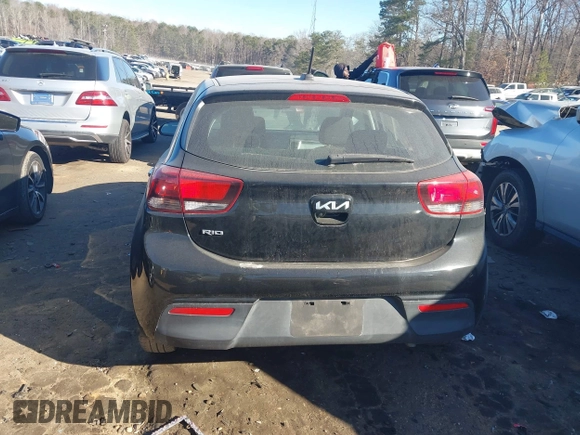 2022 Kia Rio S with VIN 3KPA25AD8NE443590, listed as a IAAI auction lot 41684325 with 73,231 mi miles and . Bid and sale history available at DreamBid. Image 16.