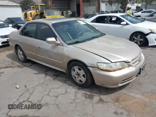 2002 Honda Accord EX z VIN 1HGCG16532A028357, wystawiony jako IAAI lot #42452953 z przebiegiem 139 324 mil mil oraz . Historia ofert i sprzedaży dostępna na DreamBid. Obrazek 1.