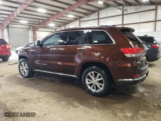 2014 Jeep Grand Cherokee Summit with VIN 1C4RJFJG2EC404605, listed as a Copart auction lot 52082335 with 157,220 mi miles and Clean Title. Bid and sale history available at carsss.com. Image 2.