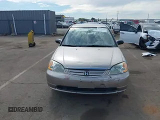 2001 Honda Civic LX with VIN 2HGES16511H554168, listed as a IAAI auction lot 42009621 with 163,801 mi miles. Bid and sale history available at carsss.com. Image 13.