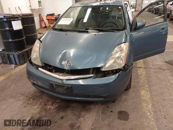 2006 Toyota Prius with VIN JTDKB20U463129691, listed as a IAAI auction lot 40922316 with 301,945 mi miles. Bid and sale history available at carsss.com. Image 6.