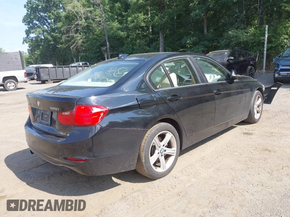 2014 BMW 3 Series 320i xDrive with VIN WBA3C3C56EK200175, listed as a IAAI auction lot 42617731 with 96,596 mi miles and . Bid and sale history available at DreamBid. Image 4.