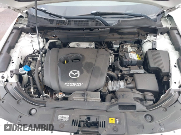2018 Mazda CX-5 Touring with VIN JM3KFACM1J1431462, listed as a IAAI auction lot 41038099 with 77,489 mi miles. Bid and sale history available at carsss.com. Image 10.