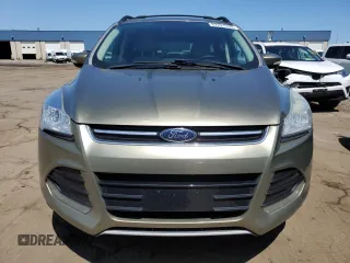 2013 Ford Escape SEL z VIN 1FMCU9H93DUD67848, wystawiony jako Copart lot #57221755 z przebiegiem 129 671 mil mil oraz Czysty tytuł • Clean title. Historia ofert i sprzedaży dostępna na DreamBid. Obrazek 5.