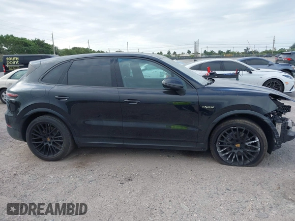 2021 Porsche Cayenne E-Hybrid Hybrid z VIN WP1AE2AYXMDA24566, wystawiony jako IAAI lot #41815737 z przebiegiem 51 149 mil mil oraz . Historia ofert i sprzedaży dostępna na DreamBid. Obrazek 14.