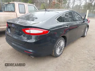 2013 Ford Fusion Titanium Hybrid with VIN 3FA6P0RU2DR281905, listed as a IAAI auction lot 41765130 with 119,348 mi miles. Bid and sale history available at carsss.com. Image 4.
