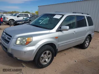 2006 Honda Pilot EX with VIN 2HKYF184X6H519132, listed as a IAAI auction lot 42030952 with 256,094 mi miles. Bid and sale history available at carsss.com. Image 2.