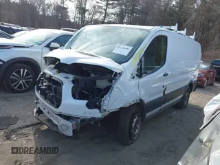 2015 Ford Transit Cargo with VIN 1FTNE1ZM1FKA69893, listed as a IAAI auction lot 41330596 with 234,974 mi miles. Bid and sale history available at carsss.com. Image 2.